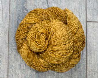 Golden Yellow Hand Dyed Yarn for Socks, Indie Dyed Yarn Made in Canada, Semi Solid Tonal knitting yarn. Fingering Weight Wool | Midas EDS