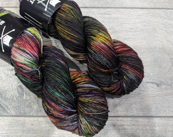 DK weight merino yarn 100% Superwash Merino Sweater weight yarn. Double Knit Weight Multi-colored black rainbow yarn. | Bifrost DK