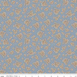 May include: A fabric with a repeating floral pattern. Clusters of small white flowers with yellow centers are scattered across a light blue background with subtle vertical stripes. The fabric is measured in inches.