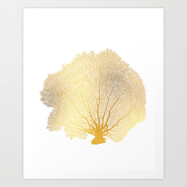 May include: A gold-colored sea fan coral silhouette on a white background.