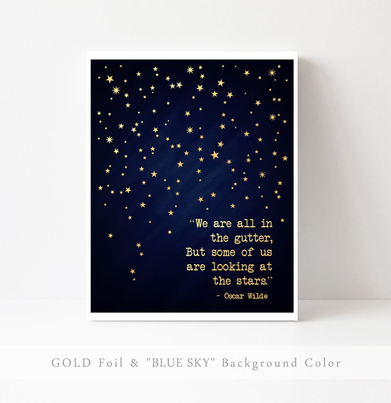 May include: A navy blue background with gold foil stars and a quote by Oscar Wilde: "We are all in the gutter, but some of us are looking at the stars."