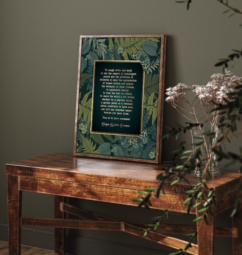 Puede incluir: Una impresi&oacute;n enmarcada con fondo verde y detalles dorados. La impresi&oacute;n presenta una cita de Ralph Waldo Emerson sobre la risa, el respeto y el afecto. La cita est&aacute; rodeada de un dise&ntilde;o floral de hojas.