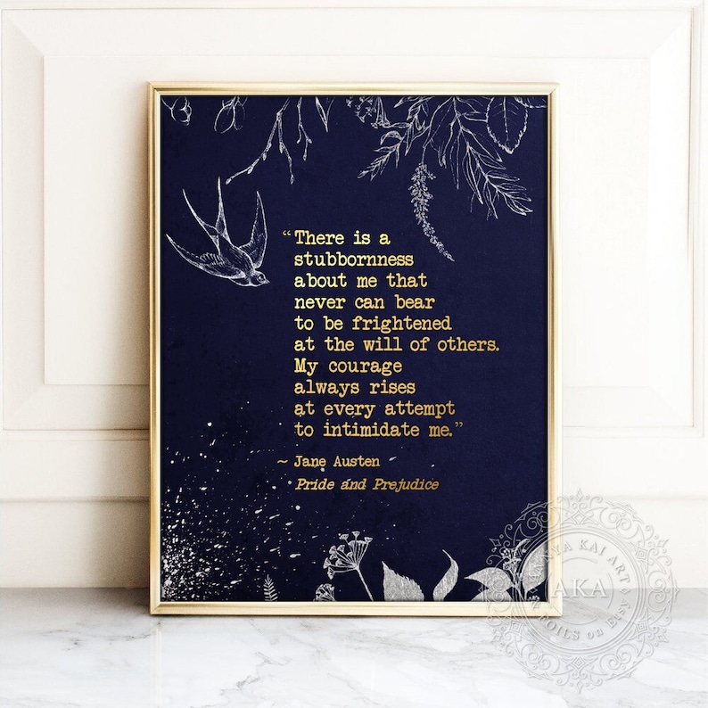 May include: A navy blue printable art print with a gold frame features a white silhouette of a bird and floral designs. The print includes a quote from Jane Austen's Pride and Prejudice: "There is a stubbornness about me that never can bear to be frightened at the will of others. My courage always rises at every attempt to intimidate me."