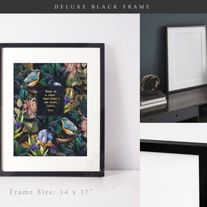 May include: A black framed print with a floral design and two blue birds. The print includes the quote "There is a vision that doesn't use words, listen." - Rumi. The frame is 14 inches by 17 inches.