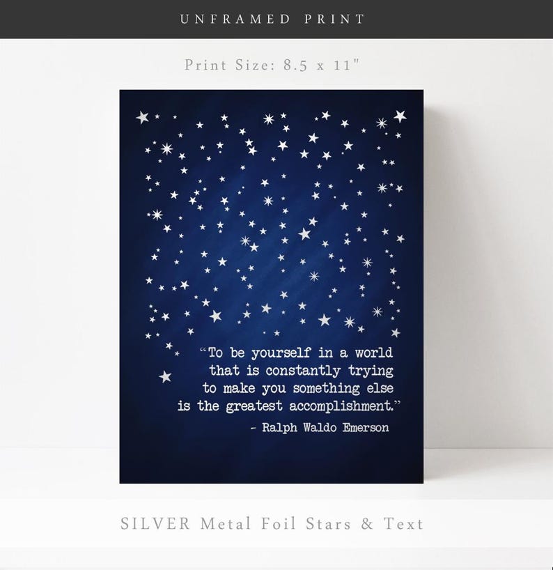 May include: A blue background with silver foil stars and the quote "To be yourself in a world that is constantly trying to make you something else is the greatest accomplishment." - Ralph Waldo Emerson. The print size is 8.5 x 11 inches.