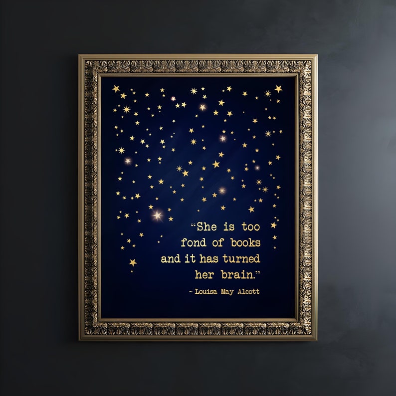 May include: A framed print with a dark blue background and gold stars. The print features a quote by Louisa May Alcott: "She is too fond of books and it has turned her brain."