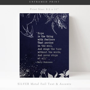 May include: An 8.5 by 11 inch unframed print with a navy blue background and silver foil text. The print features a quote by Emily Dickinson: "Hope is the thing with feathers That perches in the soul, And sings the tune without the words, And never stops at all."