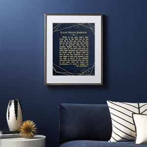 May include: A navy blue framed print with gold text and geometric shapes. The text reads "Write it on your heart that every day is the best day in the year. He is rich who owns the day, and no one owns the day who allows it to be invaded with fret and anxiety. Finish every day and be done with it. You have done what you could. Some blunders and absurdition, no doubt crept in. Forget then as soon as you can, tomorrow is a new day, begin it well and serenely, with too high a spirit to be cumbered with your old nonsense. This new day is too dear, with its hopes and invitations, to waste a moment on the yesterdays." by Ralph Waldo Emerson.