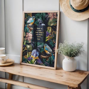 May include: A framed print with a dark background featuring a floral pattern with birds and a quote by Rumi: "There is a voice that doesn't use words, listen."