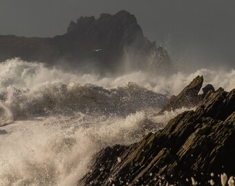 Stormy weather at Clogher Dingle Co Kerry with huge waves breaking in front of "An Fear Marbh" / "The Sleeping Giant" in February 2022