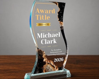 May include: A wave-shaped glass award trophy featuring a black and gold agate-style edge design. The clear center displays the text Award Title, Presented To, Michael Clark, For Exemplary Performance and Outstanding Achievement, and the year 2026.