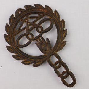 Vintage Wilton Cast Iron Trivet, Heart in Hand with Celtic Knot and Laurel Wreath, Chain Handle Footed Hot Pot Stand, 8 Inches Long