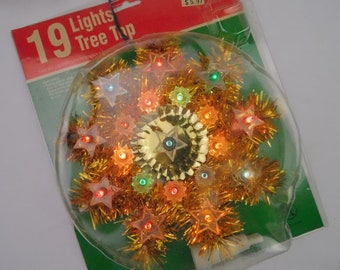 Working Vintage Lighted Star Tree Topper, 19 multicolor lights. Decorated gold tinsel garland. Christmas kitsch festive holiday dorm decor.