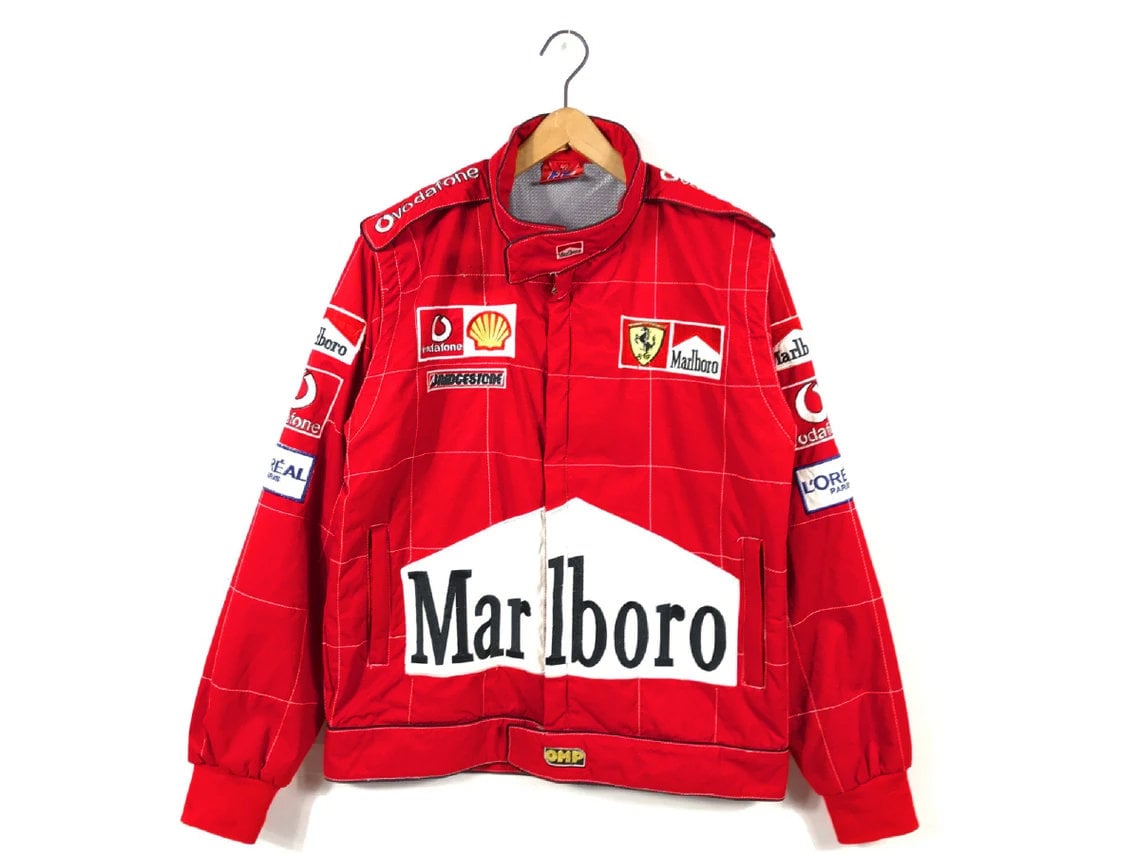 ✓ Giacca da corsa vintage - Ferrari Marlboro nera di seconda mano per 62,99  EUR su Madrid su WALLAPOP