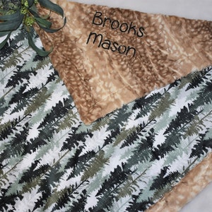 Envelop your bundle of joy in the warmth of a boy minky blanket, featuring a charming fawn design. This forest green baby gift adds a touch of woodland enchantment to your nursery