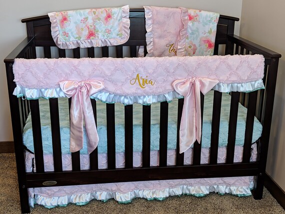 pink and gold nursery bedding