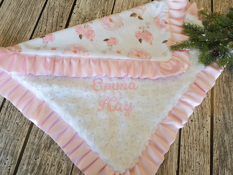 Celebrate a precious arrival with this handmade  pink minky baby blanket, a soft and boho-inspired gift for baby girls.