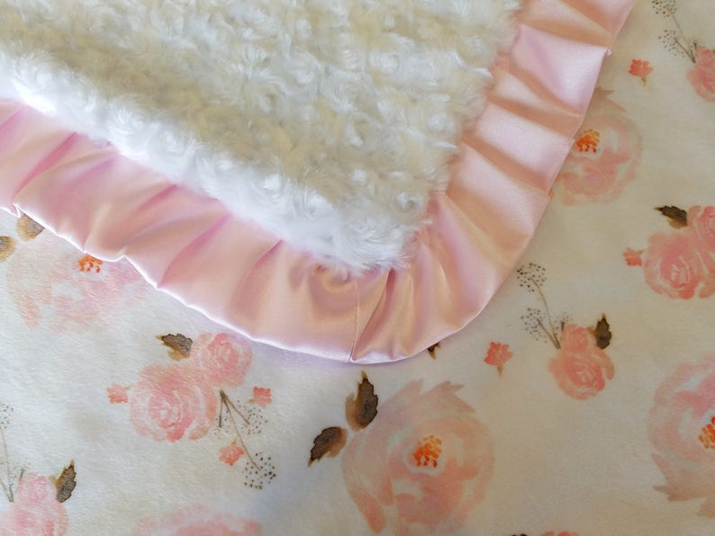 Make a statement with this soft and charming boho baby girl blanket, a delightful gift to adorn a newborn's nursery.