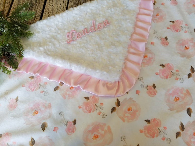 Shower a baby girl with love and warmth through this soft and cozy pink minky blanket, an ideal gift for baby showers.