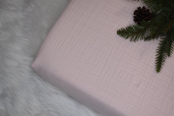 pink muslin crib sheet