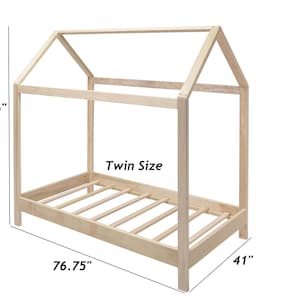 May include: A light-colored wooden house-shaped bed frame with a twin size design. The frame features a peaked roof structure and a slatted base. Dimensions are labeled as 76 inches in height, 76.75 inches in length, and 41 inches in width.