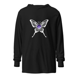 May include: Black long-sleeve hooded shirt with a white butterfly graphic and a purple iridescent circle in the center of the butterfly.