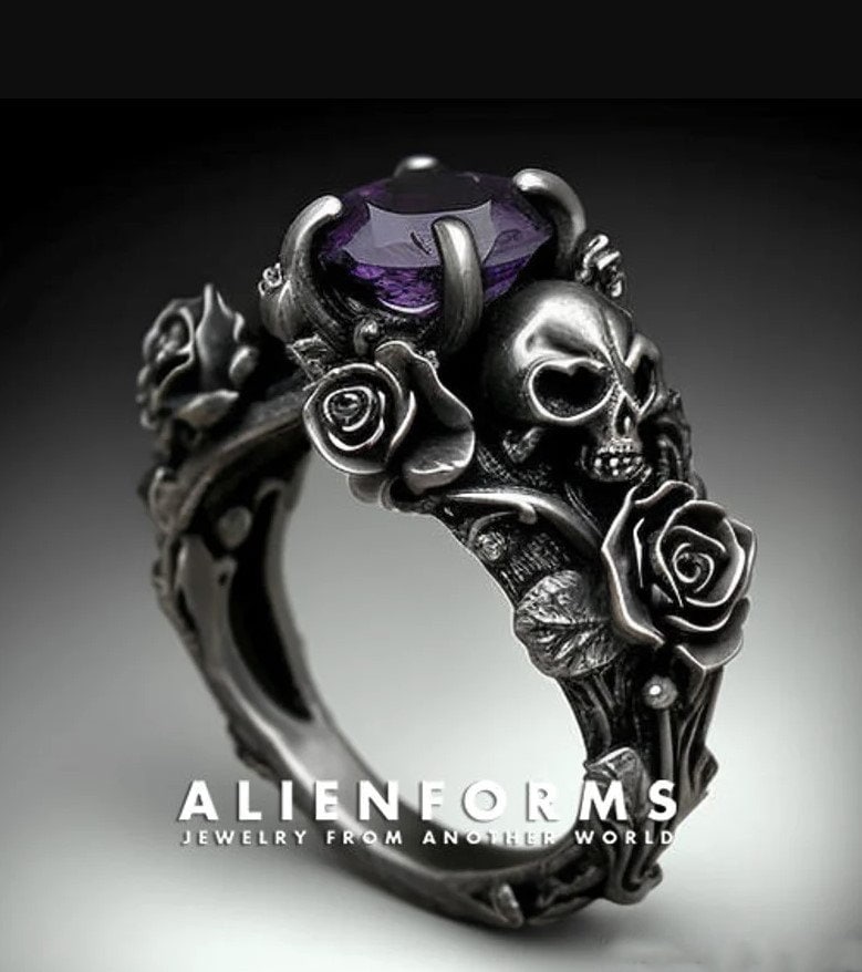 Black ring with skulls discount