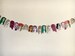 Drag Race bunting, includes Bianca Del Rio, Alaska, Bob the Drag Queen, Violet, Katya Zamolodchikova and Jinkx Monsoon 