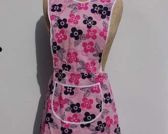 flowerpower new apron of dead stock from the Sixties half pinafore model with typical vintage retro print pink flowers 100% cotton