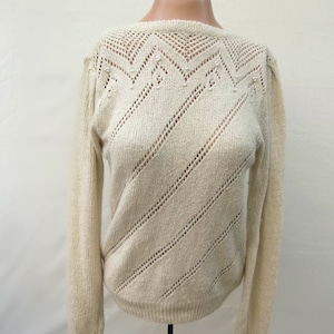 Vintage Knitted 80&#39;s Hi-Rollers sweater with pearls and gathered shoulders. Delicate soft Decorative pointelle stitching. Silk. Angora.
