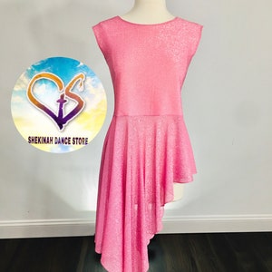 May include: Pink sleeveless dance top with a glittery finish and a high-low hemline. The top is asymmetrical, with one side longer than the other. The top is on a mannequin.