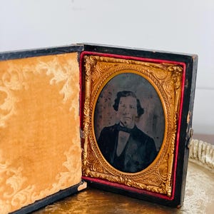 Antique TinType Photo in Leather Embossed Book with Latch, Male with Bowtie, Ambrotype, 2.75&quot;