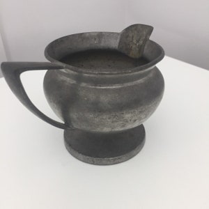 American SPCO Pewter handled creamer