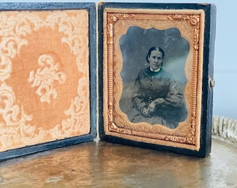 Antique TinType Photo in Leather Embossed Book with Latch, Woman sitting in Chair, Ambrotype, daguerreotype 2.75"