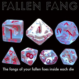 May include: Set of six clear dice with red and white numbers and a red fang design. The dice are translucent and show the fang design through the clear plastic. The dice are labeled with the numbers 1 through 6. The text "Fallen Fang" is written in white letters on a black background above the dice.