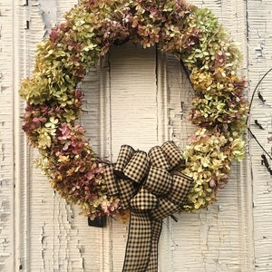 Listing #6
Dried Hydrangeas fully covering grapevine wreath with primitive plaid bow.