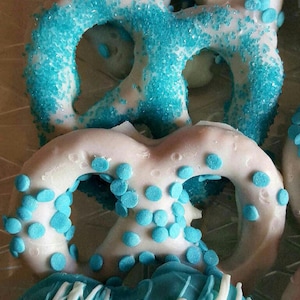 Chocolate Covered Pretzels!  White Chocolate Decorated in Blue Or Pink!  Baby Shower, Birthday Party, Christening Graduation Bridal!