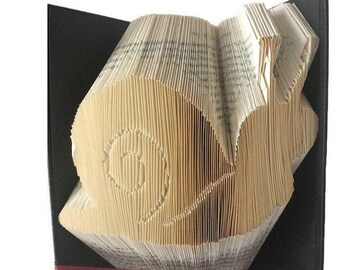 Faltmuster für Schneckenbücher. DIY Geschenk für Gärtner. Machen Sie sich Ihre eigene Wintergarten Deko.  Erstellen Sie eine Buchskulptur mit einem KOSTENLOSEN Tutorial.