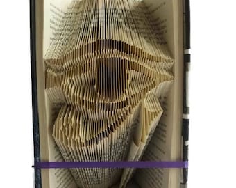 Eye of Horus Buch Faltmuster. Alles sehende Auge. Altägyptische Hieroglyphen. Schaffen Sie Ihre eigene Buchskulptur. Kostenlose Anleitung