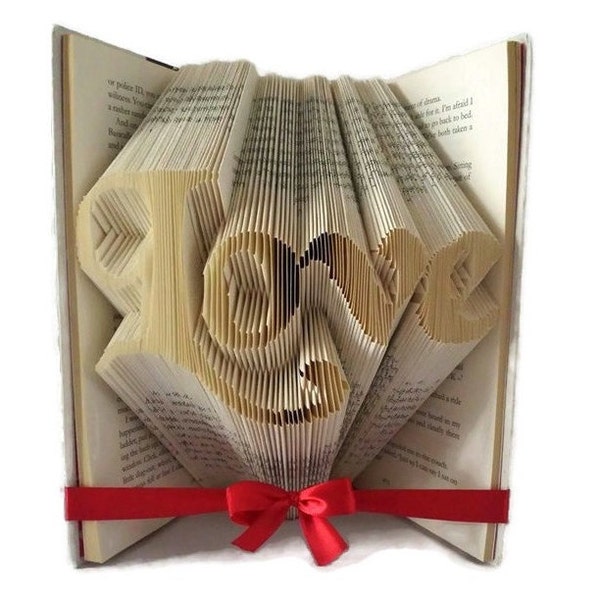 Love book folding pattern. Make a wedding or engagement gift, or unique home decor. Love word art /  book sculpture. Free tutorial