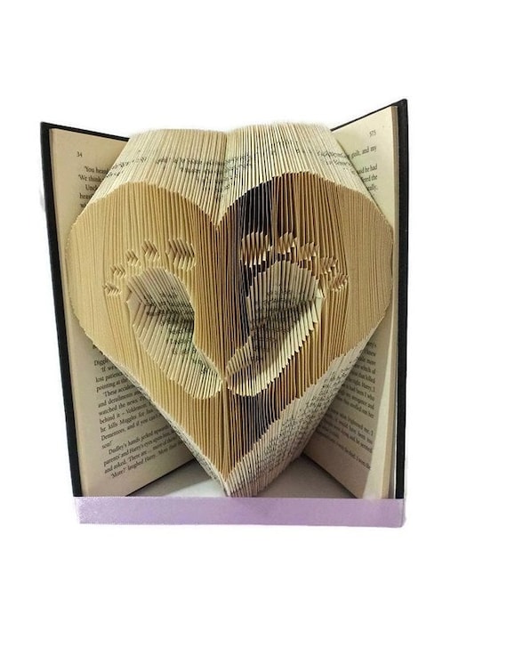 Baby feet in heart book folding pattern. DIY baby gift. Create a book sculpture for baby showers, new baby, or memorial. Free tutorial