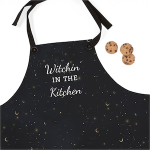 Kitchen Witch Apron - Featuring starry night background and &quot;witchin in the kitchen&quot; text -  One Size - witchy gift, wiccan gift
