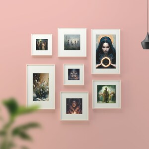 May include: A pink wall with seven white picture frames, each containing a different image. The frames are arranged in a staggered pattern. A black pendant light hangs from the ceiling.
