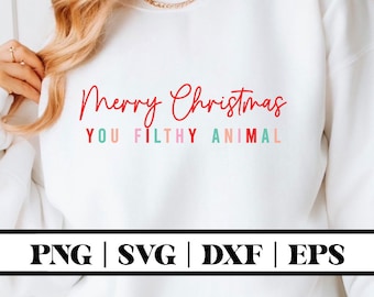 May include: White sweatshirt with the text "Merry Christmas You Filthy Animal" in red, pink, and blue lettering.
