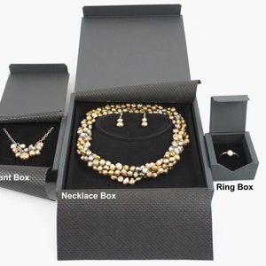 This style of box is available as a large earring/pendant box, large necklace box, and ring box.