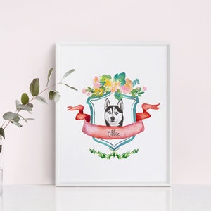 May include: A watercolour illustration of a husky dog with a floral wreath around its head. The dog is inside a teal shield with a red ribbon and the name "Ollie" written on it.