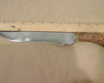 Item # 41. 8 1/2 inch titanium blade. Shed antler handle. Pewter bolster.