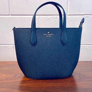 Bolso bandolera tipo cartera Kate Spade Glimmer negro pequeño