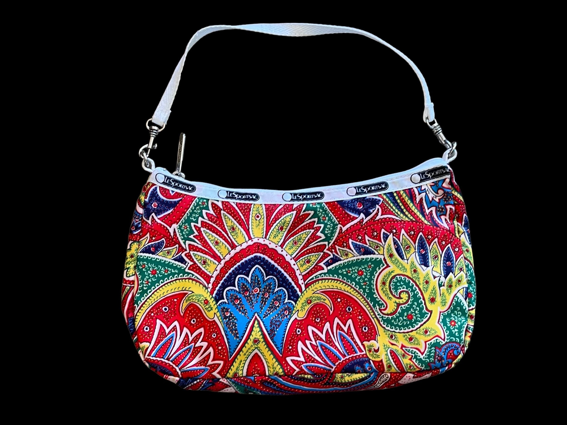 Flipping vintage Lesportsac bags is a favorite sport of mine!lol if th