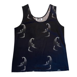 May include: A black sleeveless tank top with a white print of stylized birds. The tank top has a scoop neck and is made of a soft, comfortable fabric. The brand name "Irissi" is printed on the label.